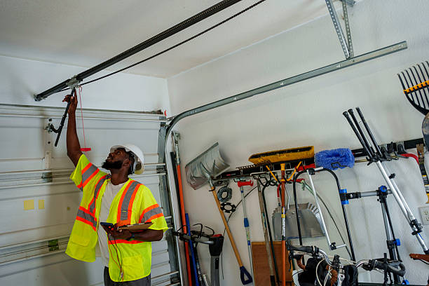 Professional Garage Door technician working in Elmwood Park, NJ